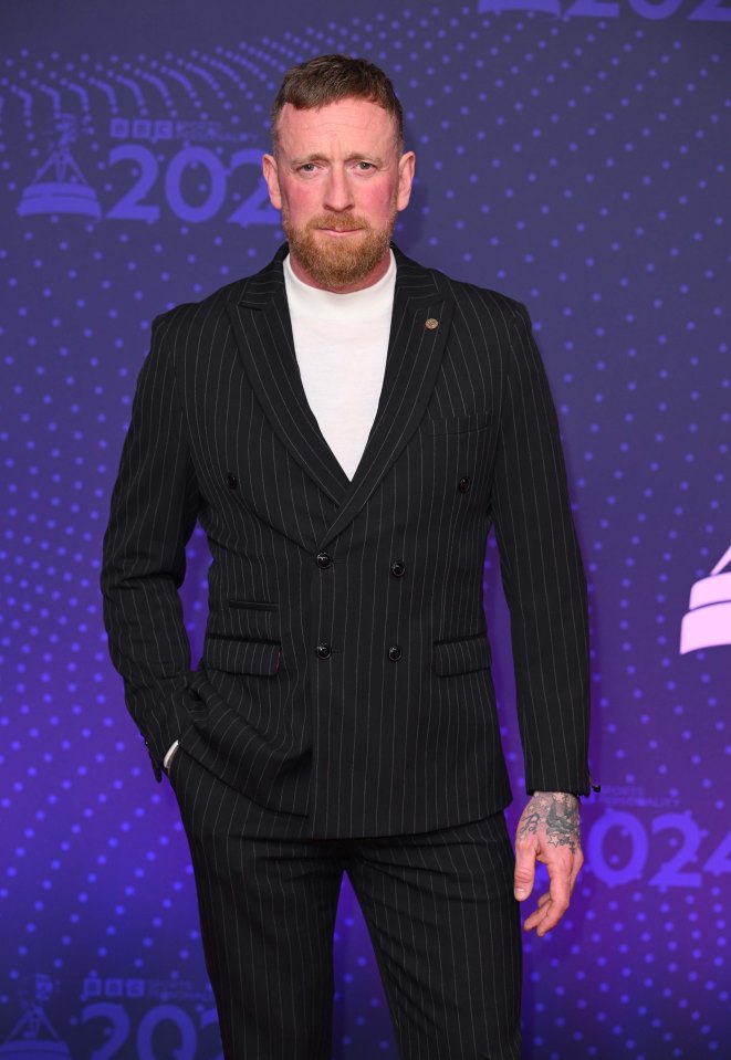 Bradley Wiggins cut a serious look on the carpet