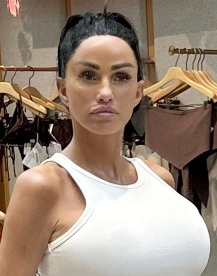 Katie Price donned a skimpy vest top as she braved the chill for a shopping session in Cheshire