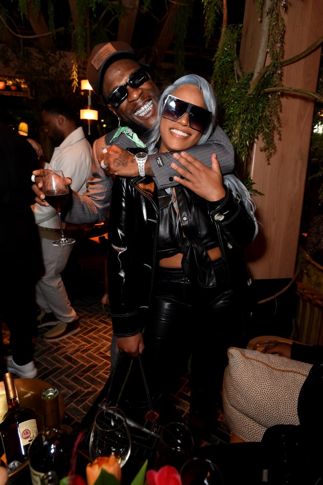 Burna Boy and Stefflon Don at a YouTube Music event.