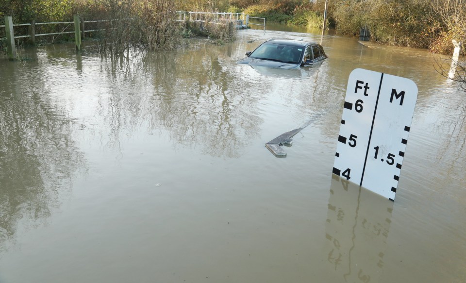 A driver got stuck in 4ft floods in Essex this morning