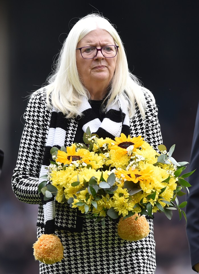 Port Vale owner laying a wreath to remember coronavirus victims.