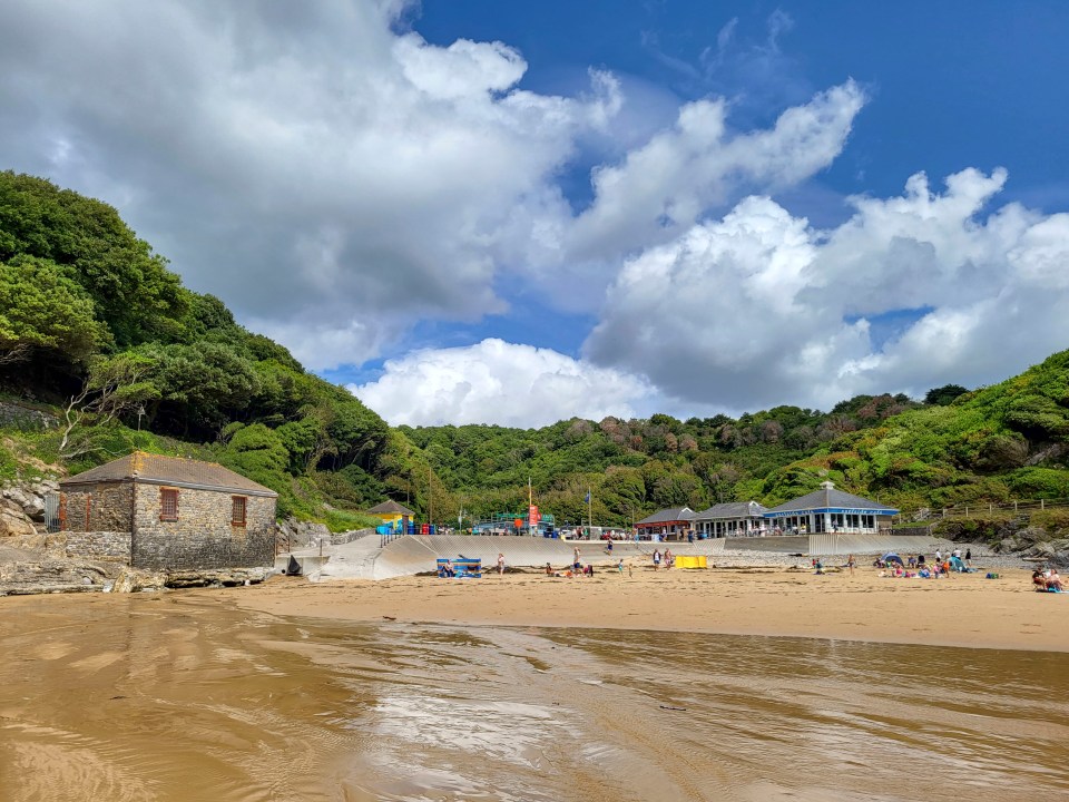 Caswell Bay on the Gower coastline is loved for its open, flat sands