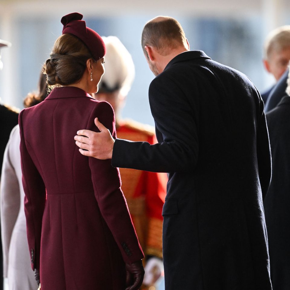 William lovingly places his hand on Kate's back at Horse Guards Parade