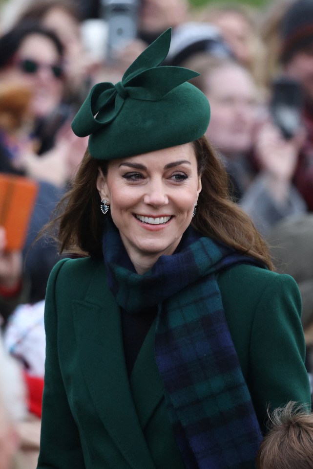 Kate Middleton looked the picture of elegance today as she dazzled in a green Alexander McQueen coat