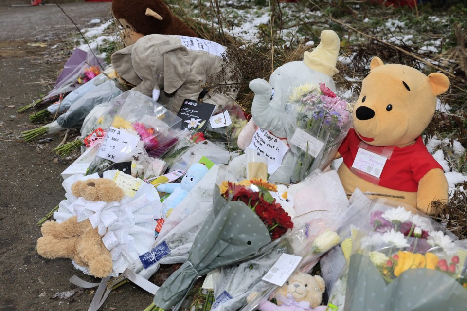 Locals left stuffed toys and flowers