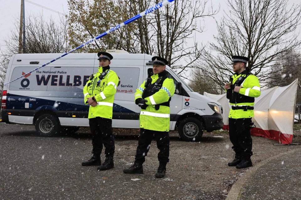 Officers at the scene by Ashtons Field in Little Hulton