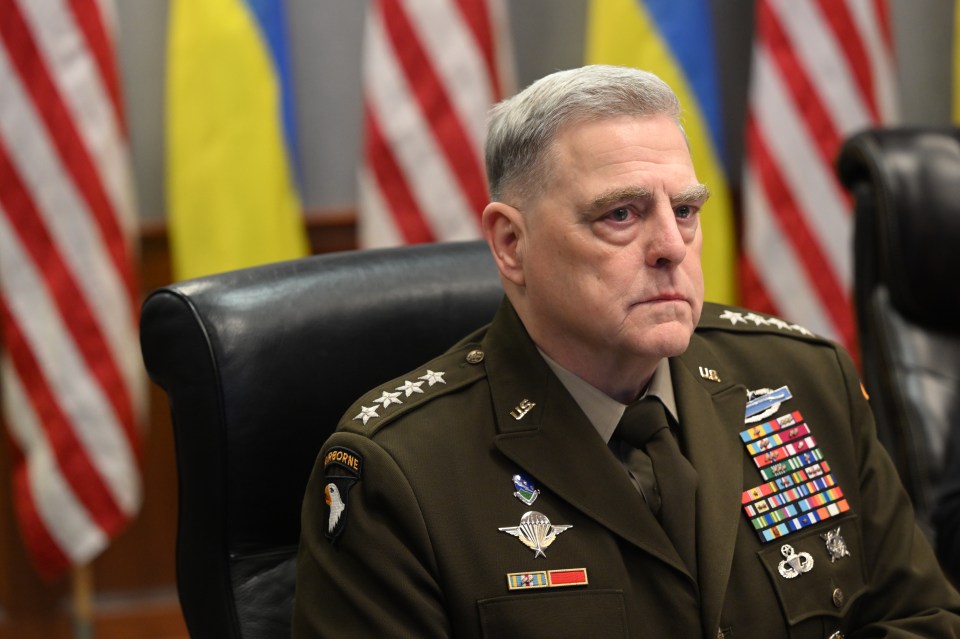 General Mark Milley in uniform at a meeting.