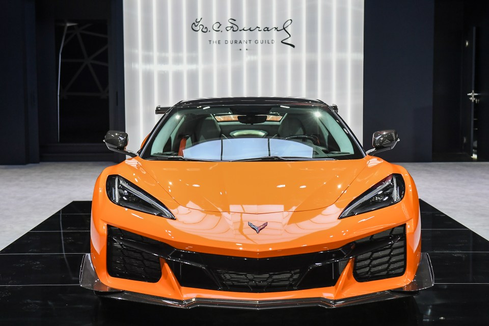 Orange Chevrolet Corvette Z06 on display.