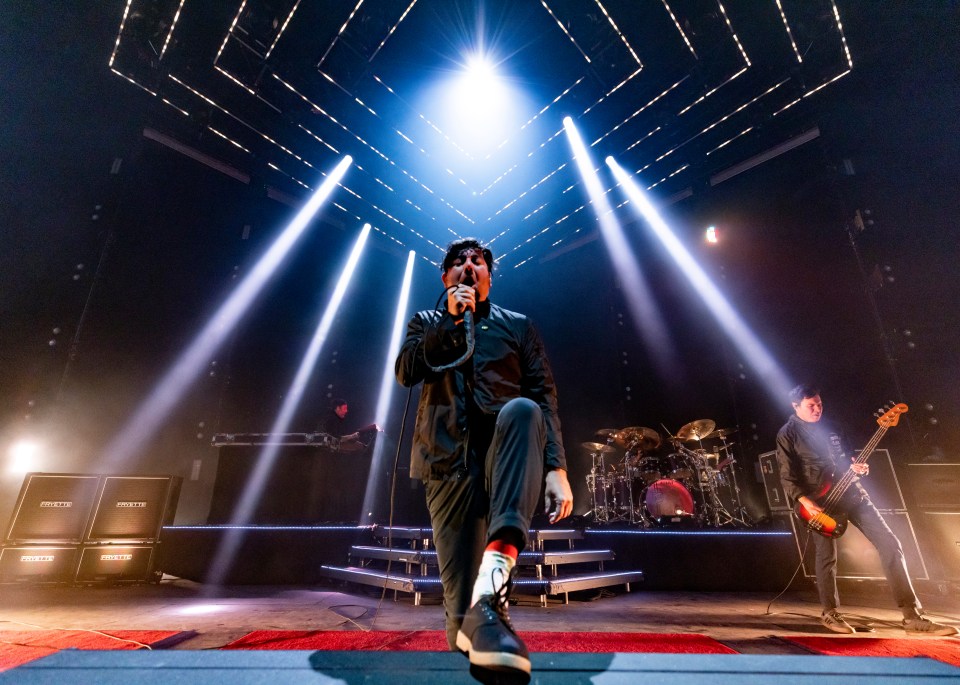 Chino Moreno of Deftones performing live on stage.