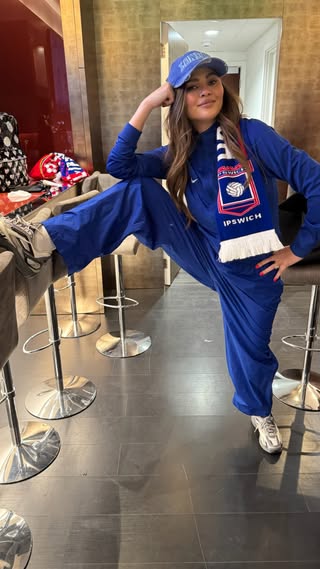 She wore a Chelsea shirt with an Ipswich scarf