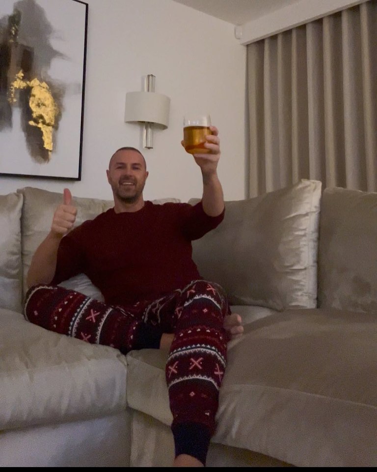 Paddy enjoying a drink at his family home with the kids