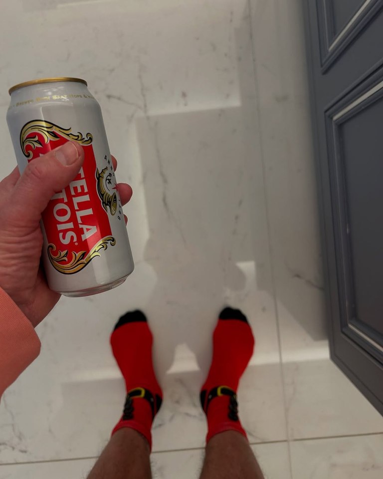 Christine McGuinness shared a photo of his socks as he enjoyed a Christmas drink