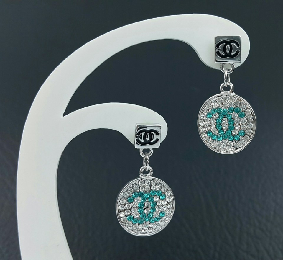 Paul took care to avoid the iconic entwined double C Chanel earrings (example pictured), to avoid Diana possibly associating them to Charles and Camilla