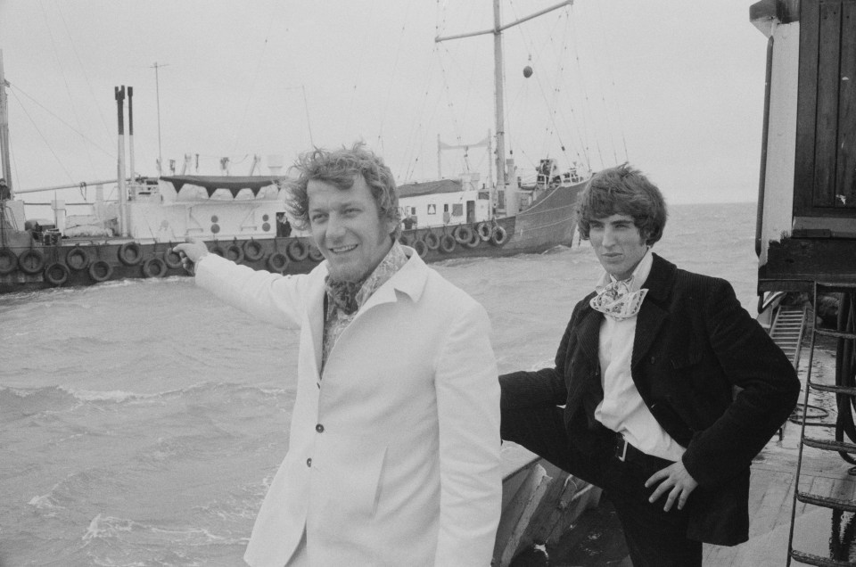 Johnnie right, with fellow DJ Robbie Dale, on a pirate radio ship in 1967