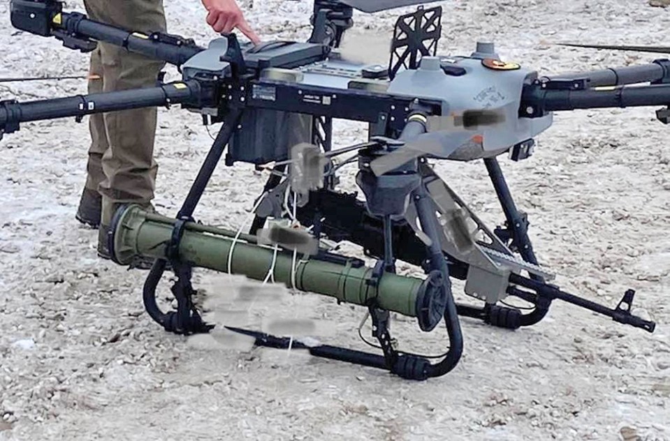 Drone with mounted machine gun.