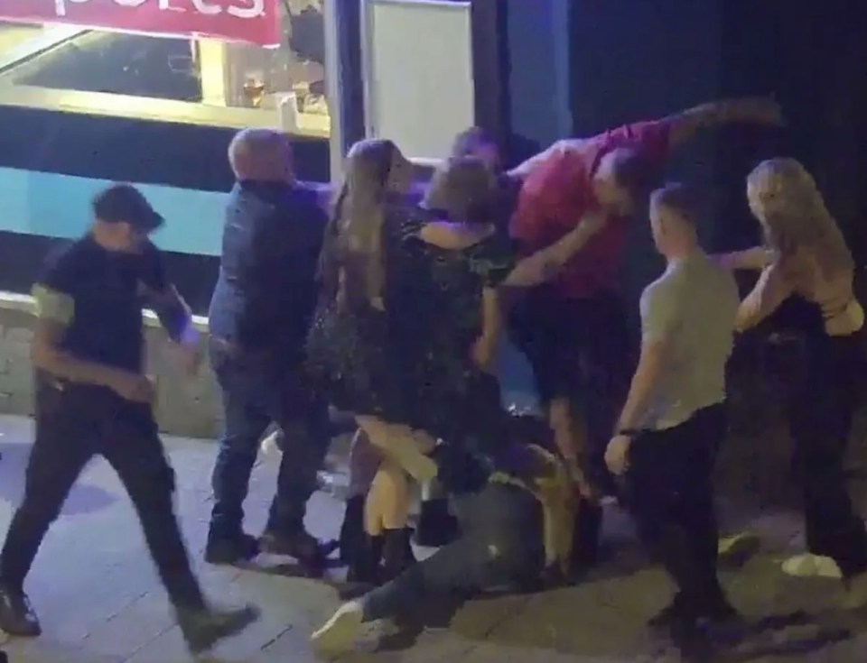 The moment Bannister stamps on the victim's head outside the bar