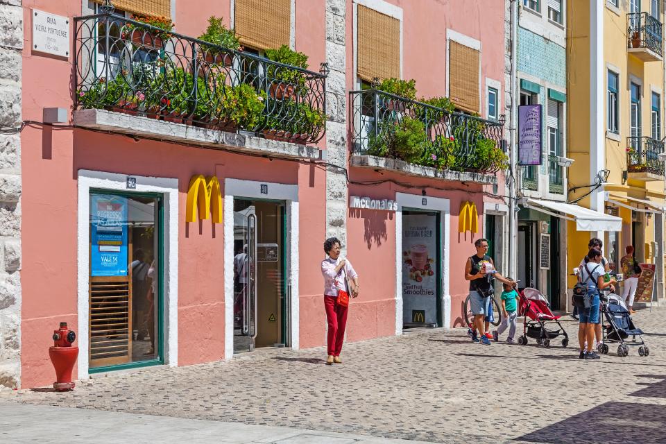 EA6TJY Belem McDonalds fast-food restaurant in Lisbon. Located in a World Heritage area is always full of tourists.