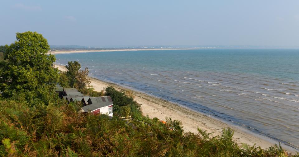 Cops have launched an investigation after a man and woman were found dead at a home in a seaside town.