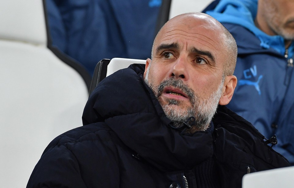 Pep Guardiola, Manchester City coach, looking pensive.