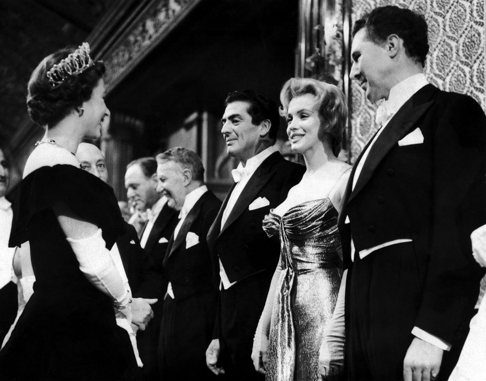 Marilyn Monroe meeting Queen Elizabeth II at the Royal Command Film Performance.