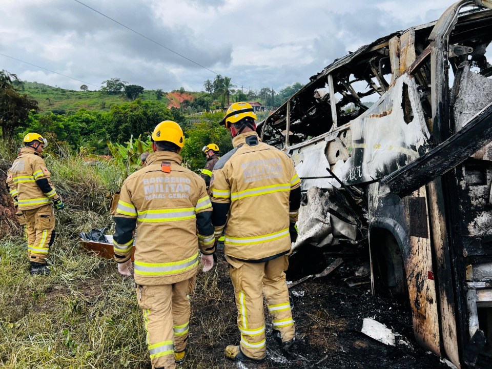 Firefighters inspect the wreckage