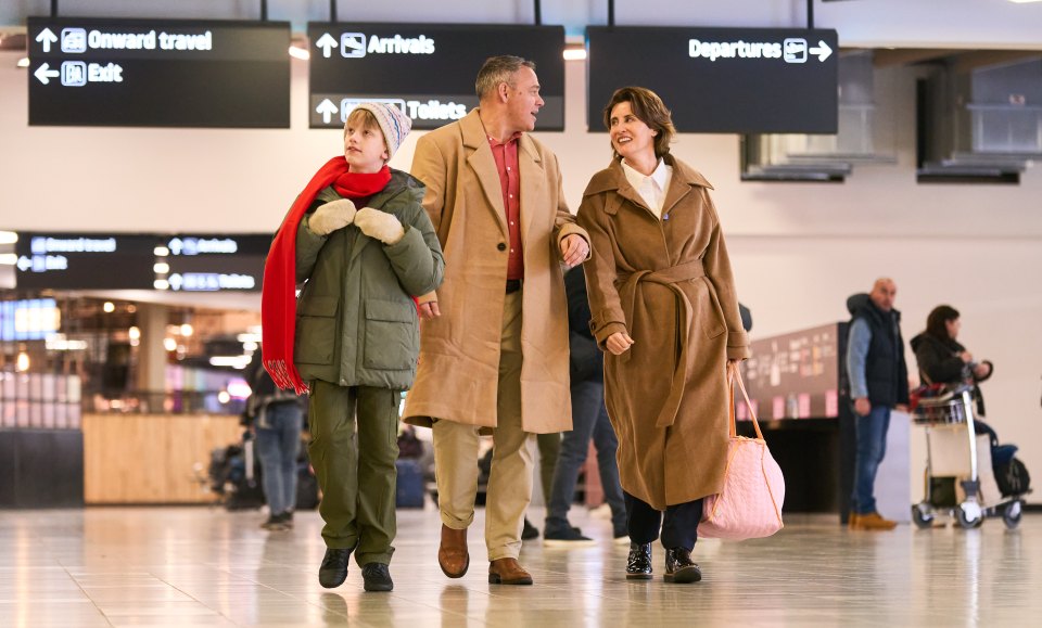 In the scenes from Luton Airport, a Kevin lookalike walks through the airport with his fictional parents