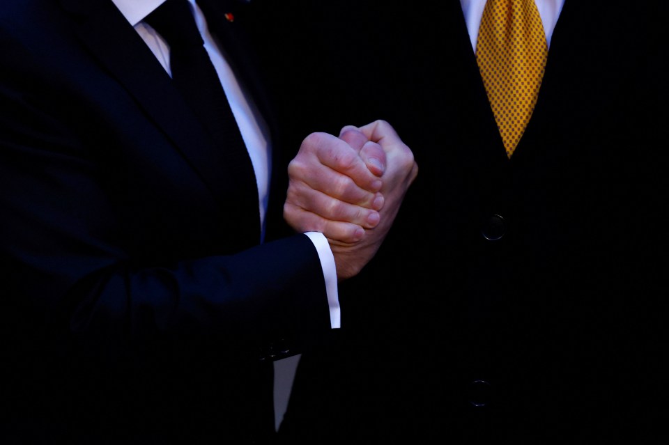 Trump grabbed Macron’s hand with a vice-like handshake