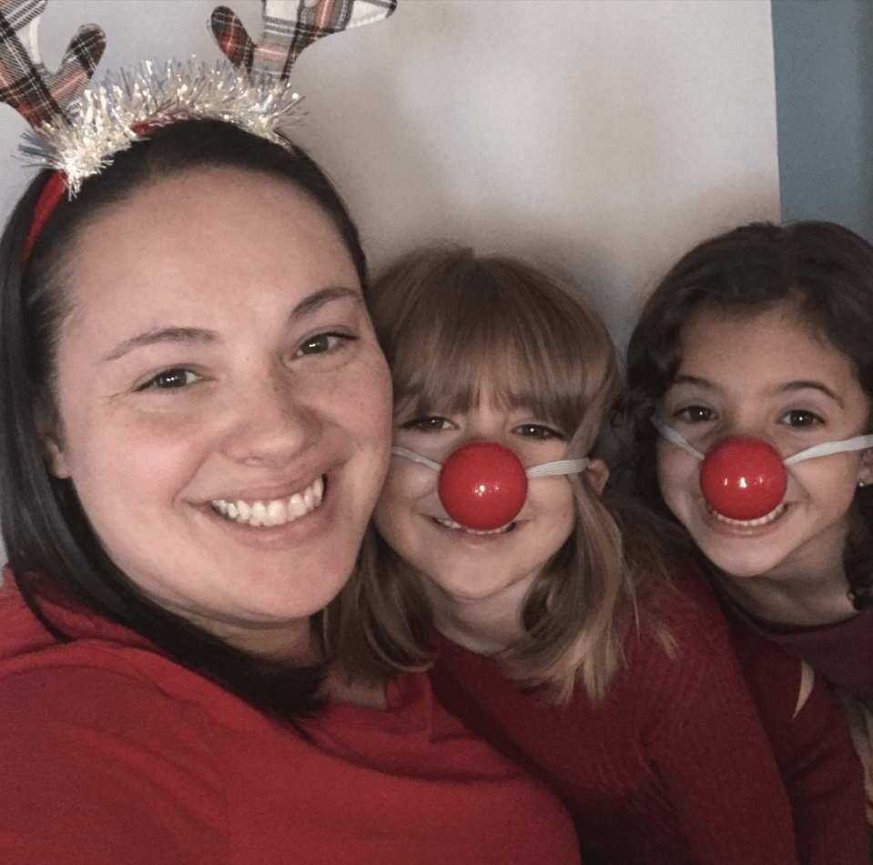 Heather Moore, pictured with her twin daughters Carmen (right) and Cate (left)