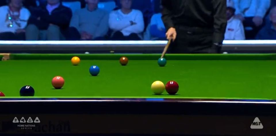 Here's the shot that caused some debate as the cue ball passes the red