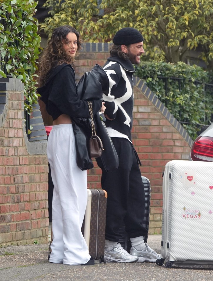 The rumoured couple's outfits matched for the taxi ride