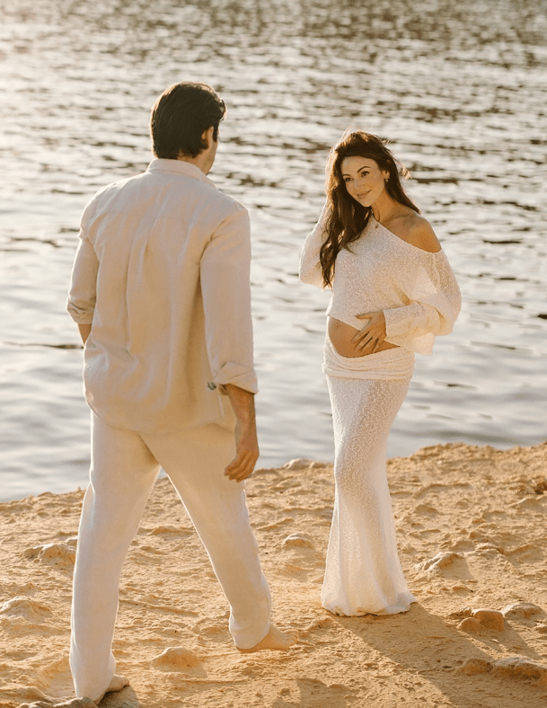 Michelle Keegan and Mark Wright announced their baby news with a stunning beach photoshoot