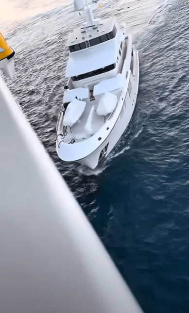 White yacht on the ocean.