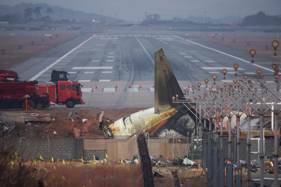 The wreckage of the aircraft after it ran off the end of the runway