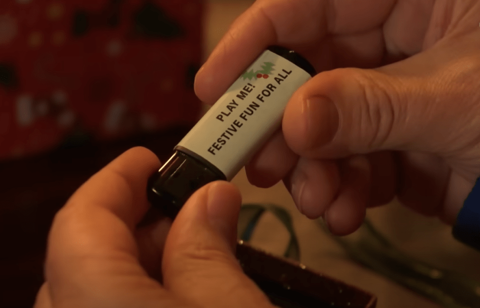 Who gifts George the USB with Cindy's confession?