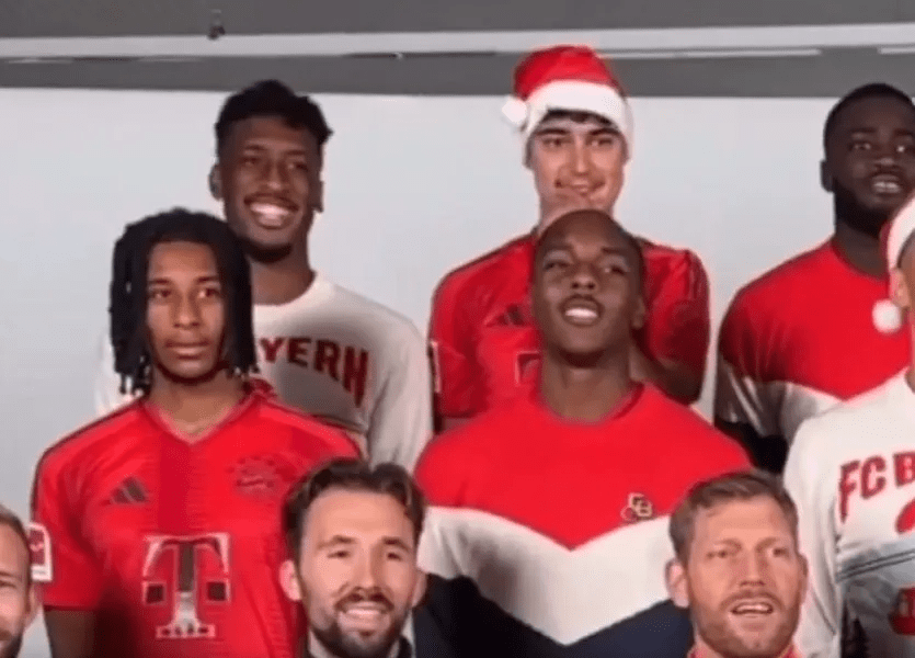 Michael Olise looked awkward as Bayern's squad sang Jingle Bells