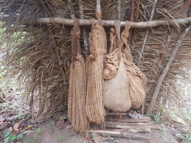 Hammocks made from tucum fibres found in the huts can sleep two people