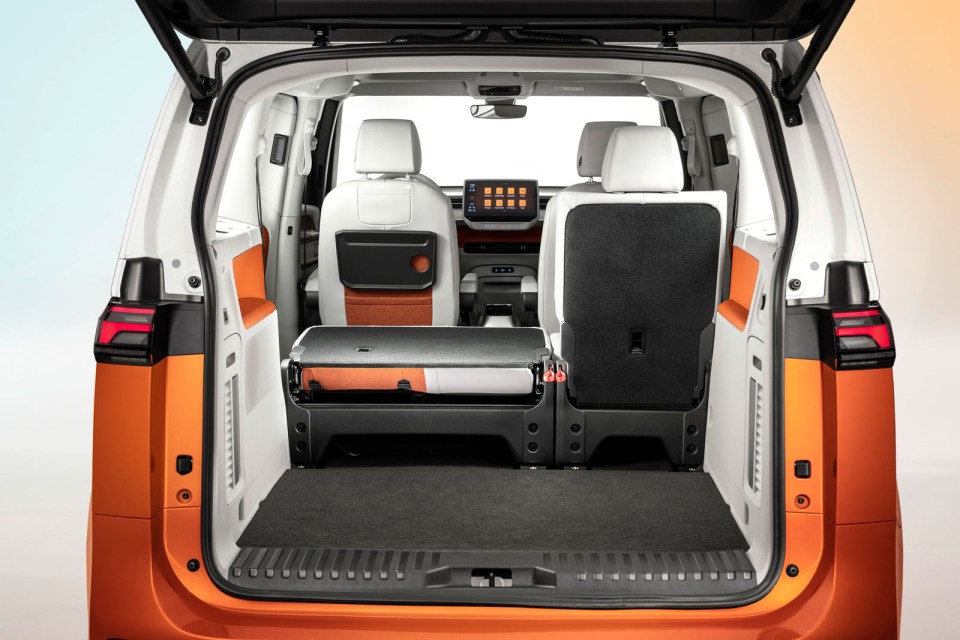 Volkswagen ID Buzz interior with rear seats folded down.