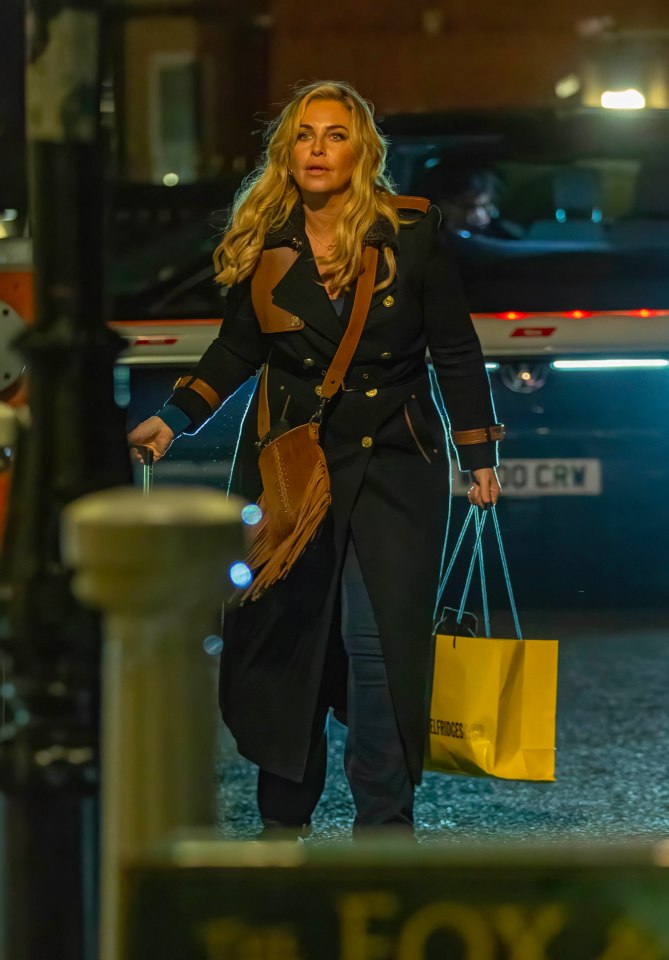 Josie Gibson had a suitcase and Selfridges shopping bag in tow