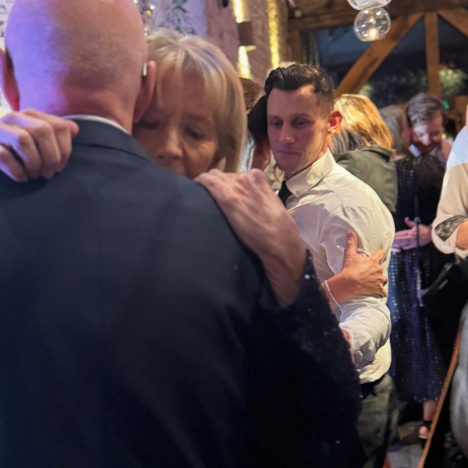 Jasper Carrott slow dancing with his wife at their son's wedding.