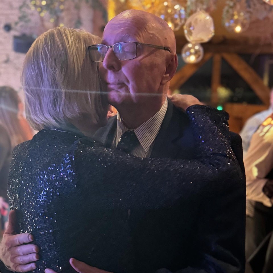 Jasper Carrott slow dancing with his wife at their son's wedding.