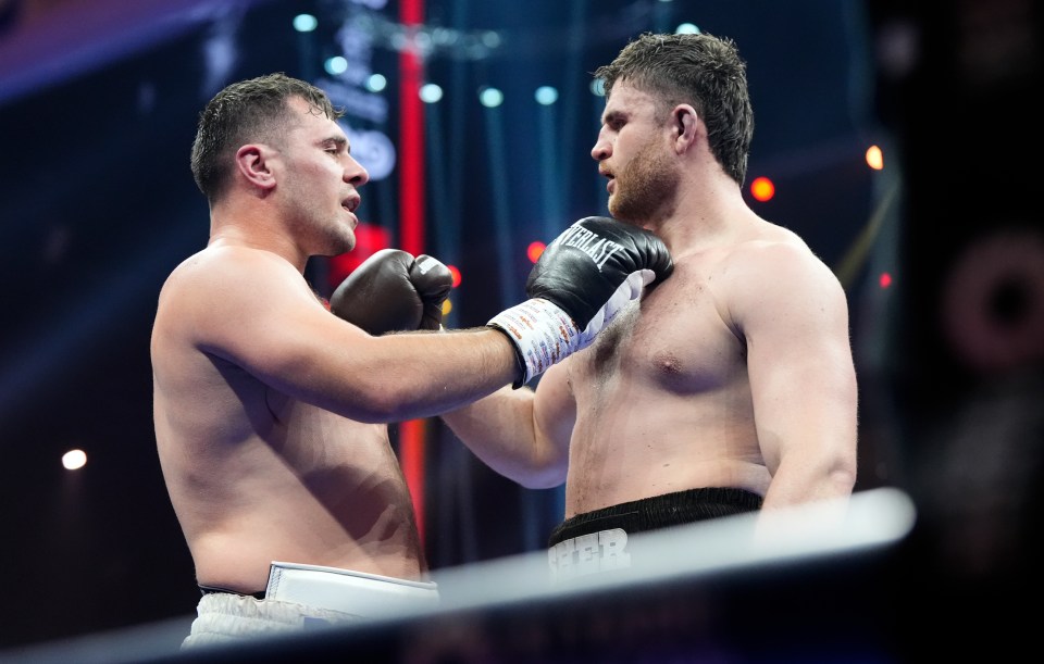 Johnny Fisher and Dave Allen after a heavyweight boxing match.