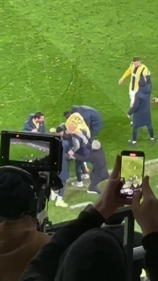 Manager Jose Mourinho had to drag his assistant coach out of the pile of celebrating players