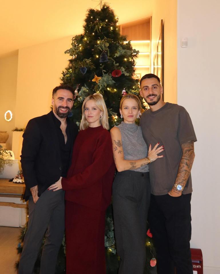 Dani Carvajal and Joselu posed with wives Daphne and Melanie Canizares