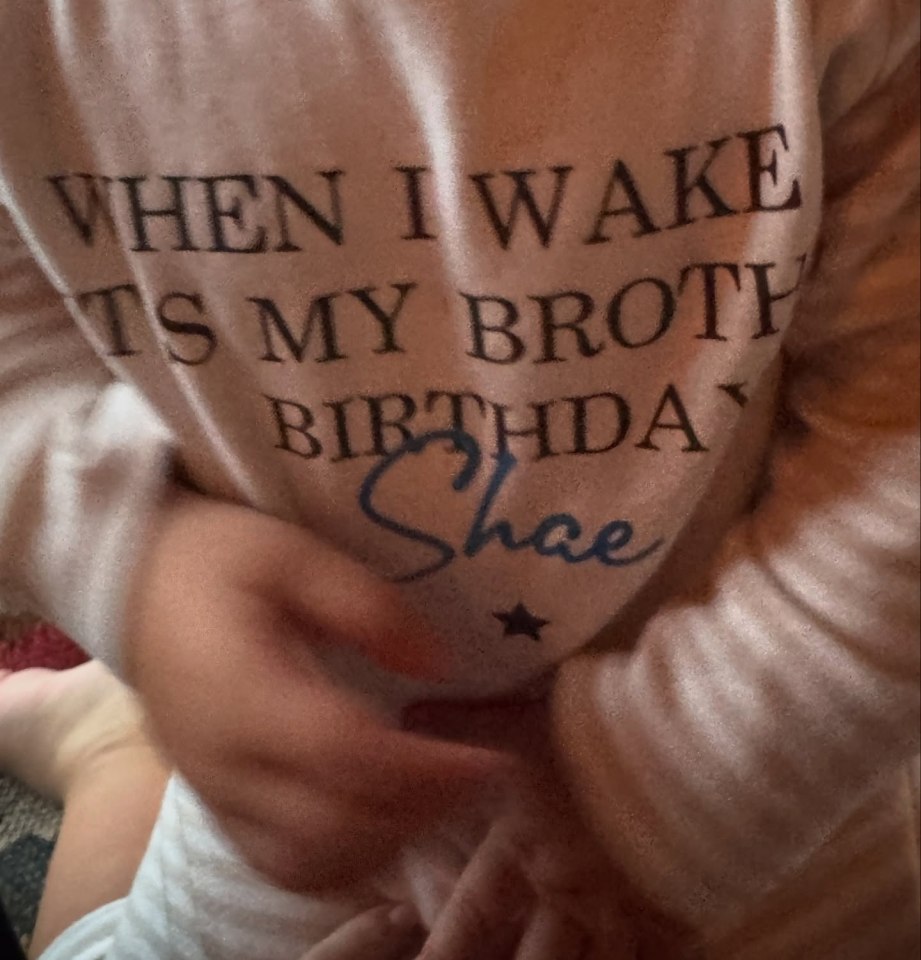 The couple's youngest, Shae, wore a sweet jumper to celebrate the occasion