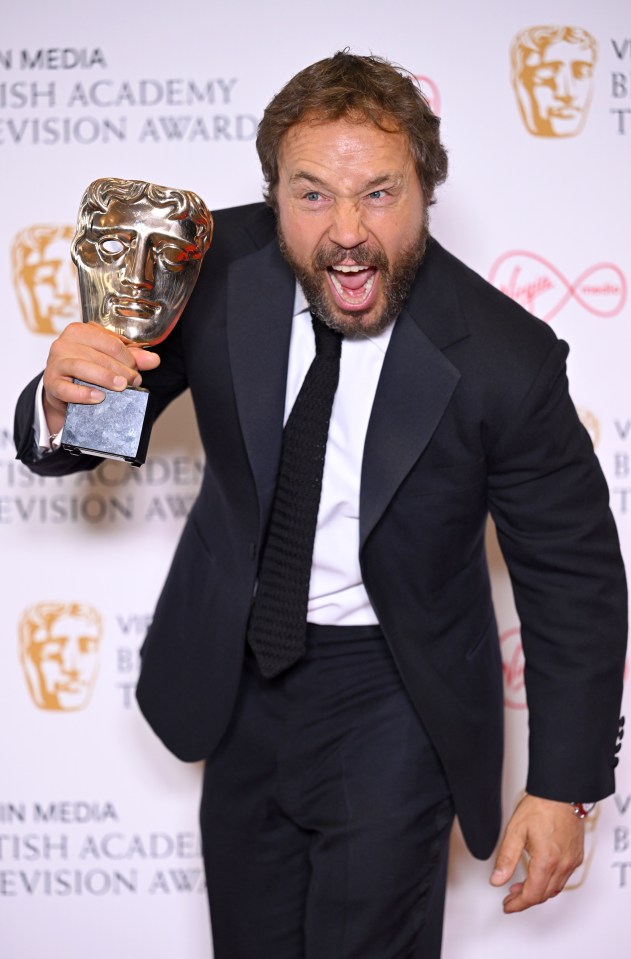 Stephen with the Bafta for Best Mini Series for Time in 2022