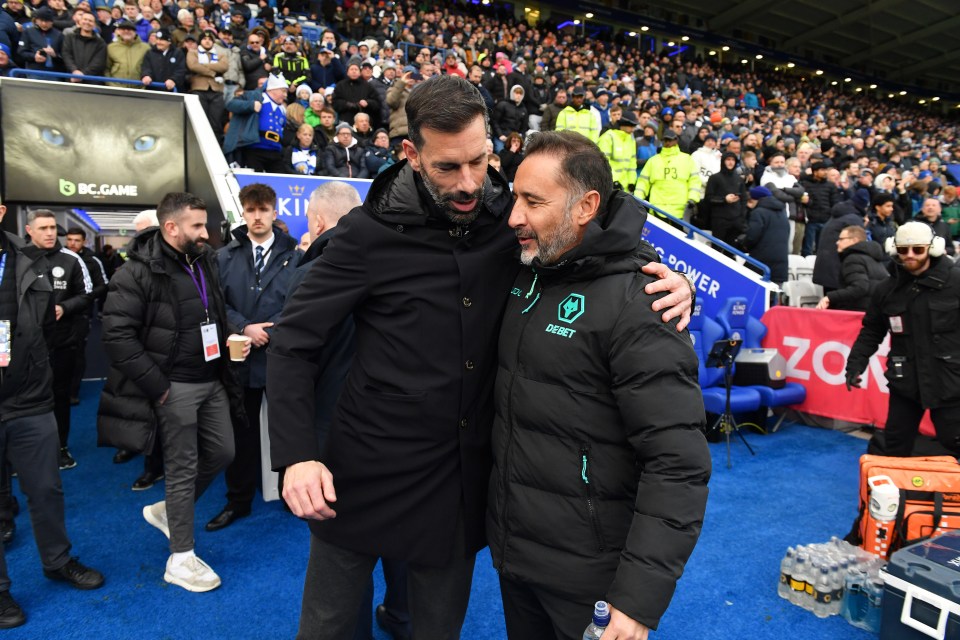 Leicester City manager Ruud van Nistelrooy and Wolverhampton Wanderers manager Vitor Pereira talking before a Premier League match.