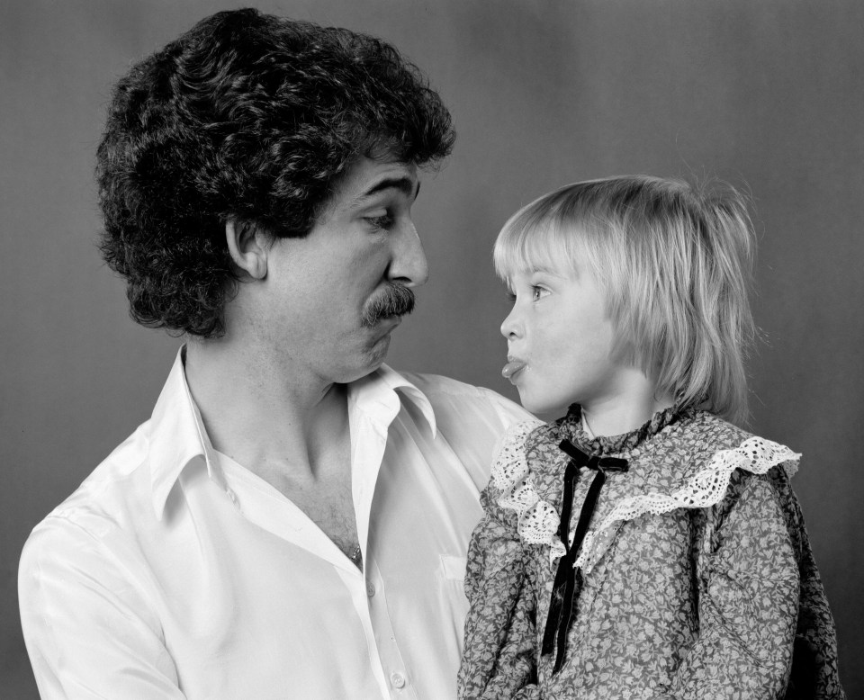 Kelly in 1979 with dad Kenny’s Liverpool team-mate Graeme Souness, who used to babysit her