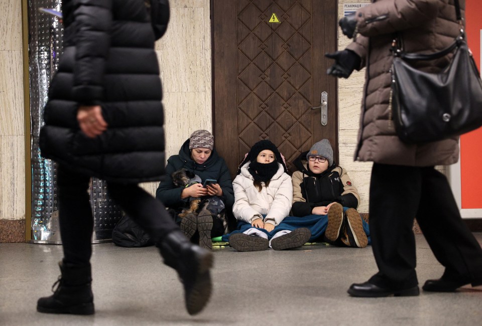 Civilians were forced to run for cover in Ukraine as they readied for NYE