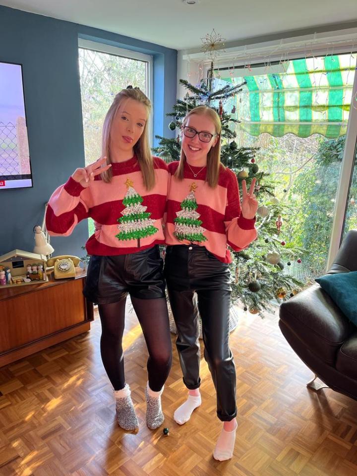 Ellie (right) and her sister Lucy in Christmas jumpers at Ellie’s last Christmas in 2022