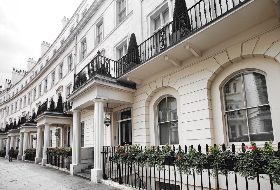 Luxury residential buildings along Grosvenor Crescent in London's Belgravia district